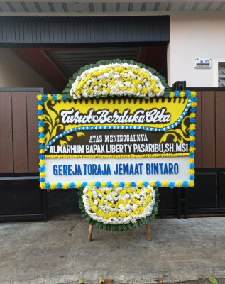 Papan Bunga Duka di Dundu